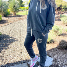 Load image into Gallery viewer, Advocate. Resilience. Never Give Up. Garment-Dyed Sweatpants